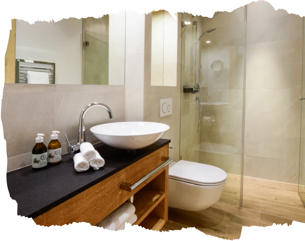 Schoen eingerichtete Badezimmer im Gaestehaus, dem Hotel am Stiegl-Gut Wildshut nahe Salzburg
